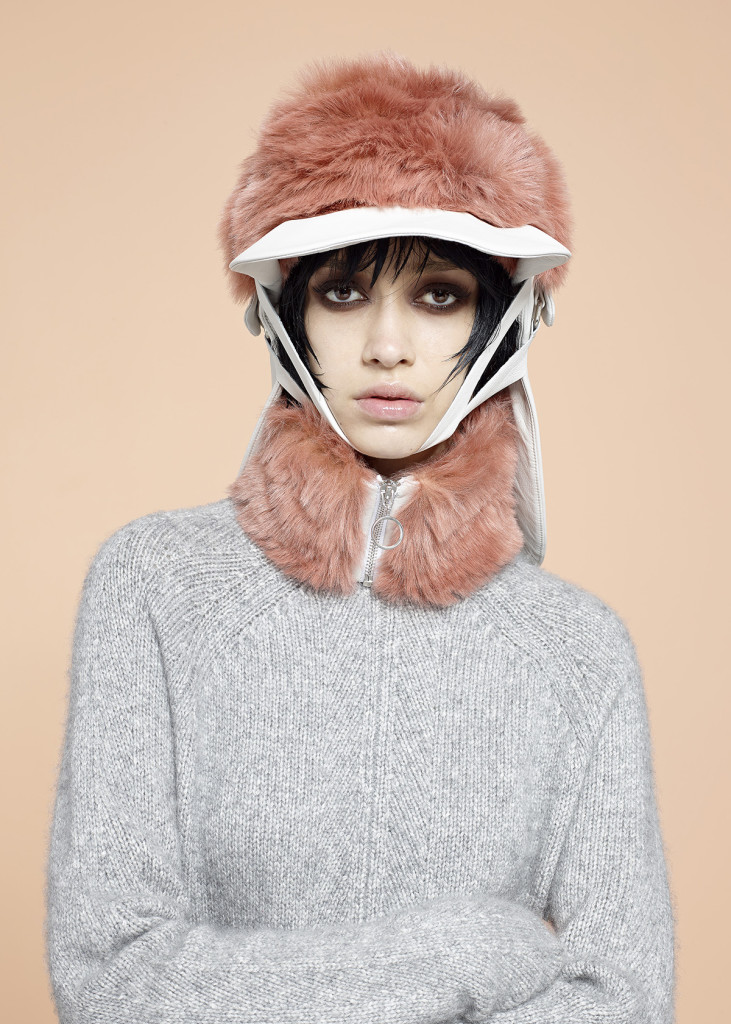 Hat: Ming Pin Tien, Neck Cuff: Ming Pin Tien, Jumper: Amanda Wakeley