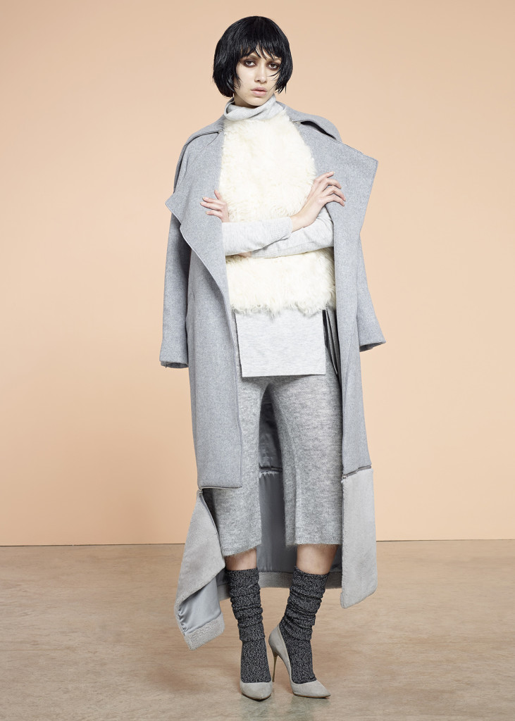 Coat: Amanda Wakeley,  Both Jumpers: Whistles,  Gilet: Maison Scotch, Culottes: Whistles, Socks: Stylist Own, Shoes: Nicholas Kirkwood